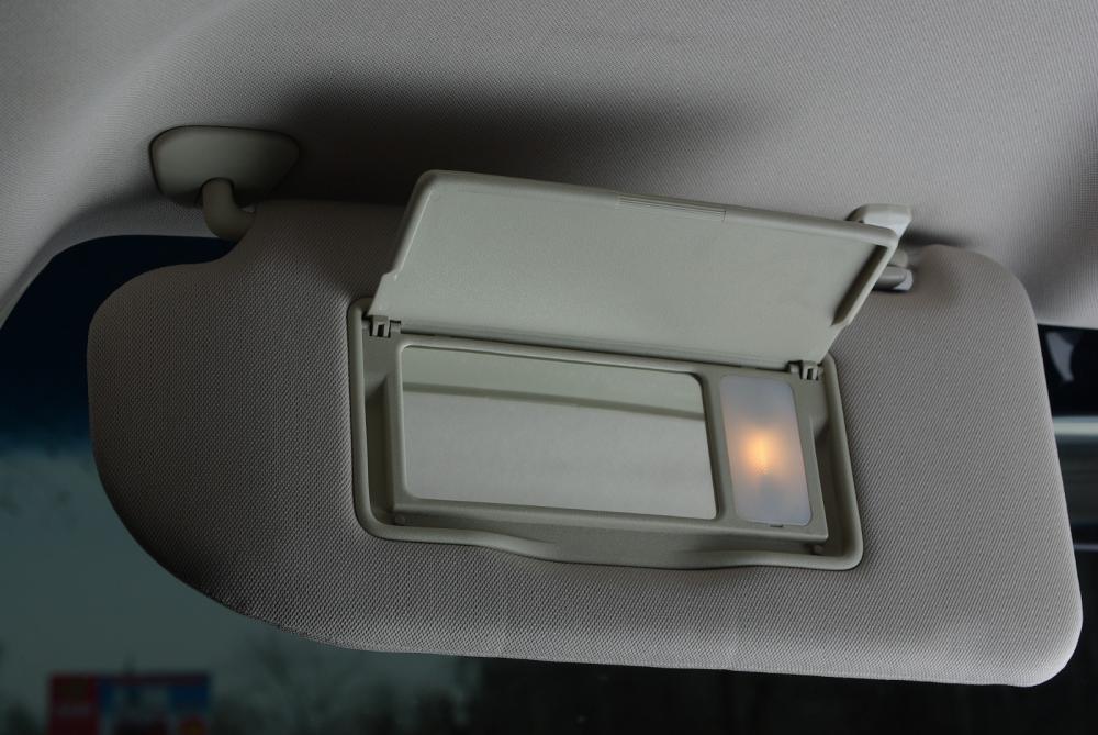 bigstock-Sun-visor-mirror-in-a-car-28667297.jpg